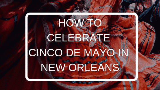 Vibrant dancers in traditional attire celebrating Cinco de Mayo in New Orleans.
