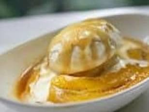 A serving of dumplings in a creamy sauce.