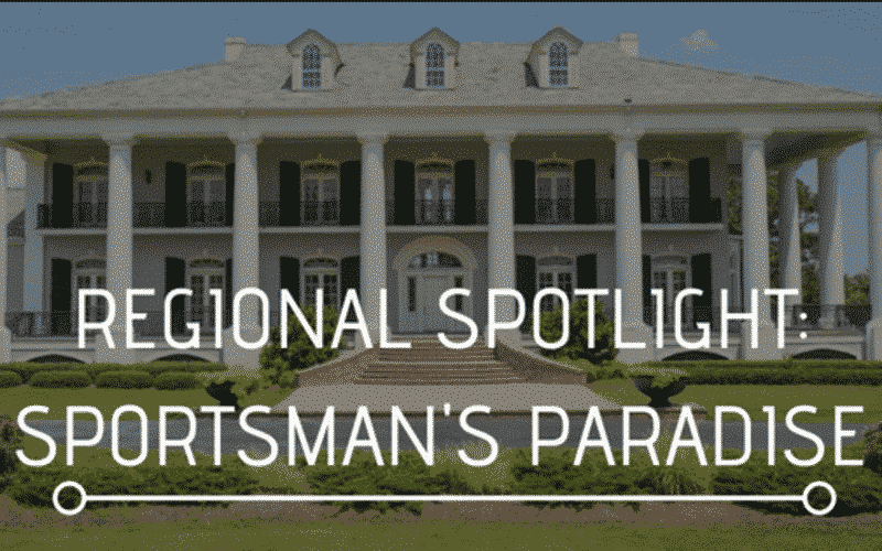 A large, elegant mansion surrounded by green landscaping, with text overlay reading "Regional Spotlight: Sportsman's Paradise."